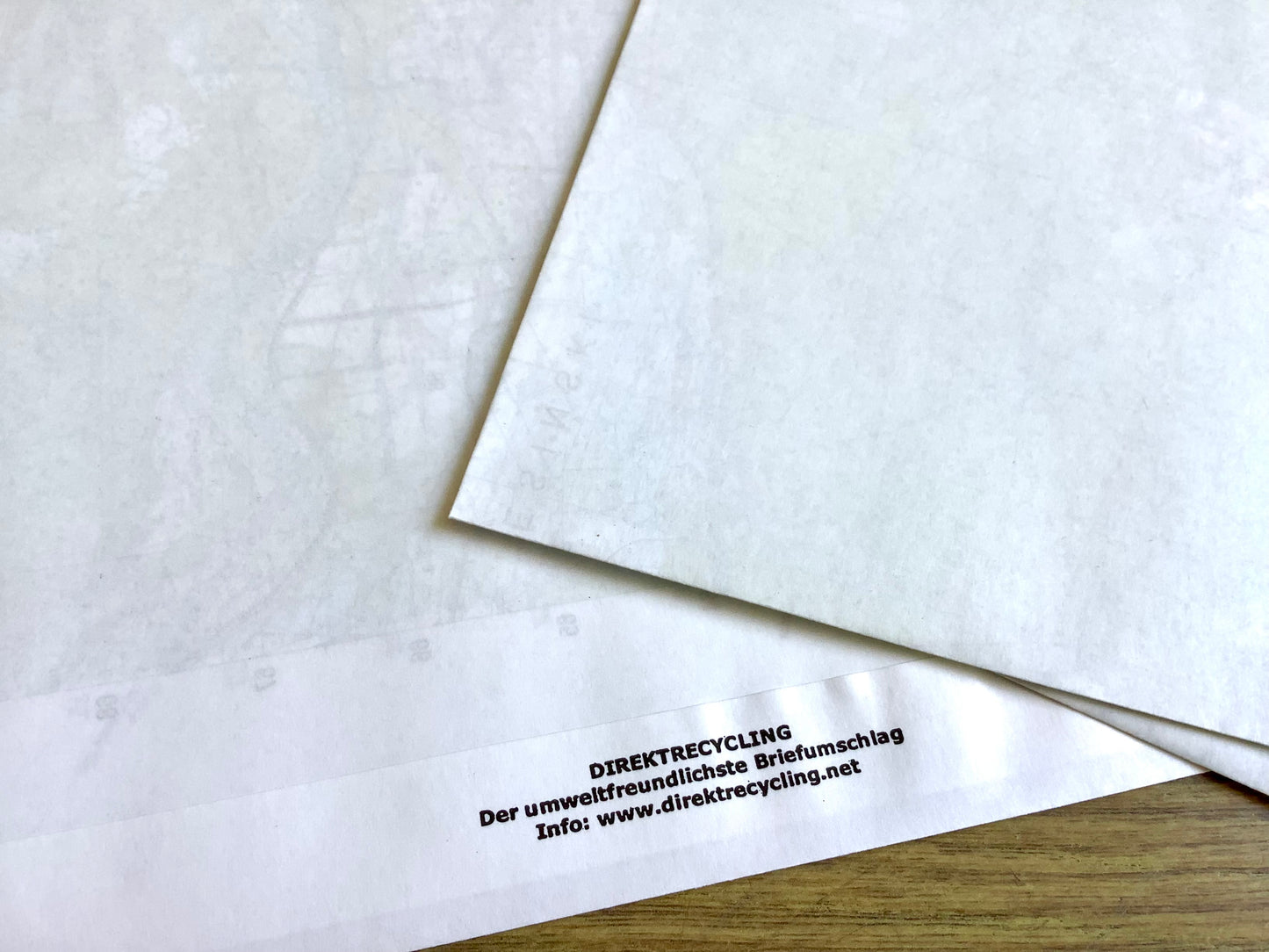 Weiße Versandtasche C4 ohne Fenster DRP (innen Landkarte)° - bei Polly Paper - Umweltfreundlicher Bürobedar