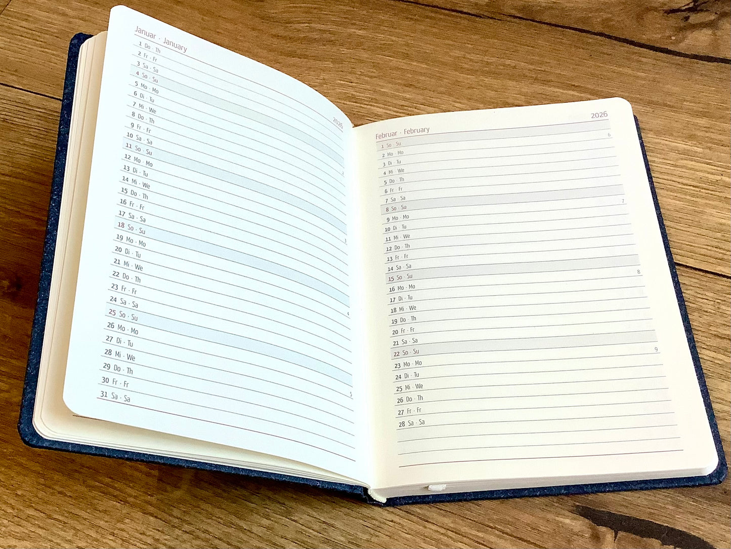 Taschenkalender A6 10x15cm 1W/2S blau Nature Line 2026