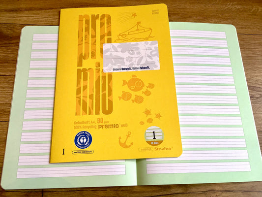 gelbes Cover, abgerundete Ecken, Lineatur 1 mit grünem Hintergrund