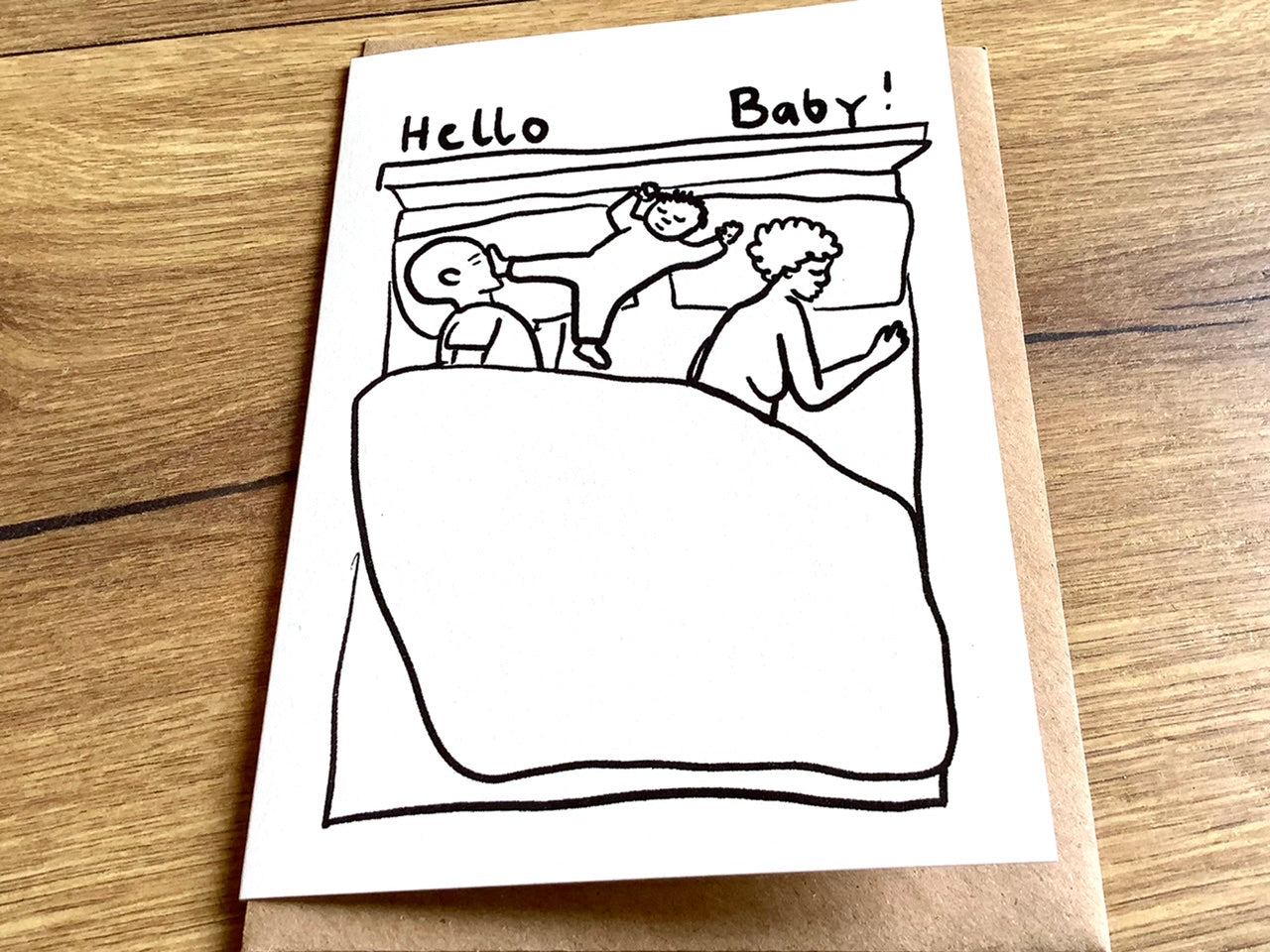 Briefkarte Hello Baby im Bett (Superjuju)