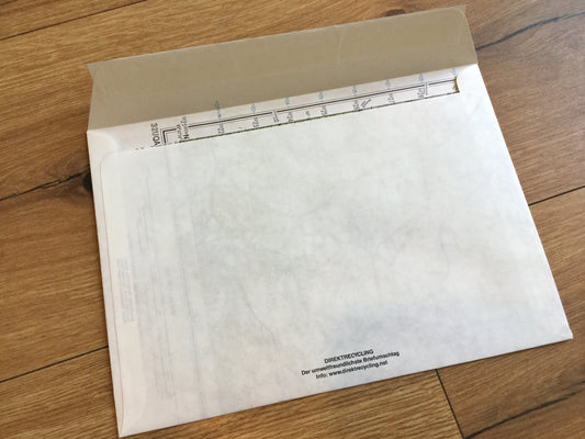 Upcycling-Versandtasche in C5 mit Landkarte innen - erhältlich bei Polly Paper, umweltfreundlicher Bürobedarf in Berlin-Mitte
