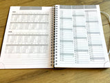 Wochenkalender A5 schwarz '25/2026 Spiralb.