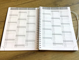 Wochenkalender A5 schwarz '25/2026 Spiralb.