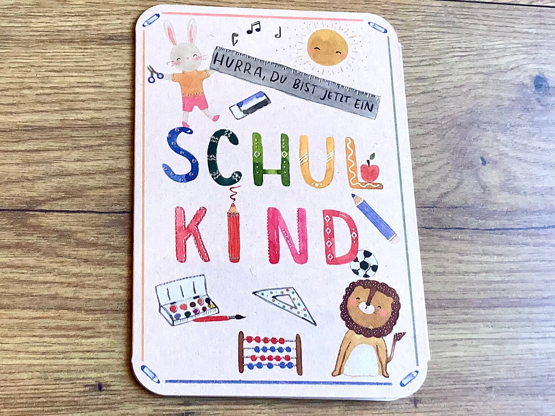 Bunte Klappkarte zur Einschulung - Karte und Umschlag in Einem. Alles zum Schulbeginn bei Polly Paper in Berlin-Mitte