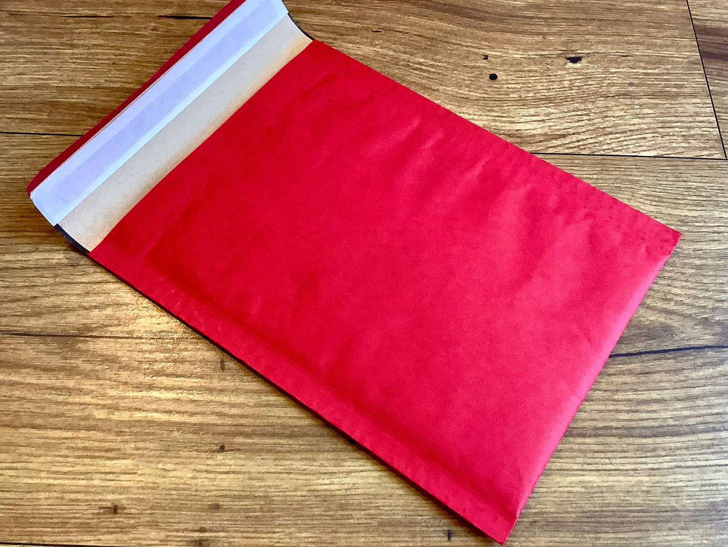 Versandtasche 13x20cm wattiert eco rot