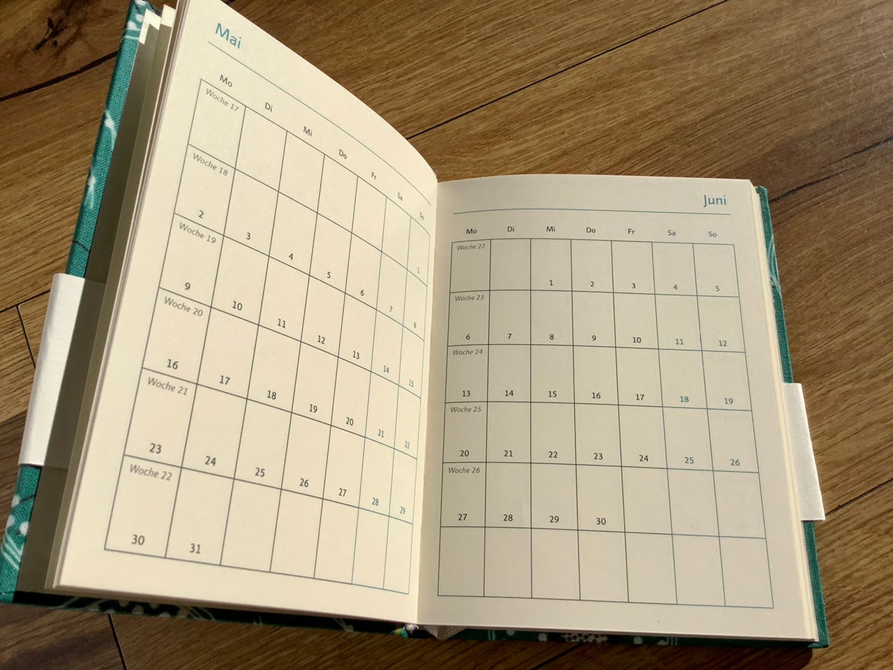 Wochenkalender B6 Stoff 1W/1S 12x16 2026 Kaspar Hauser