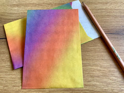 Flachbeutel Regenbogen 7x9cm Papier