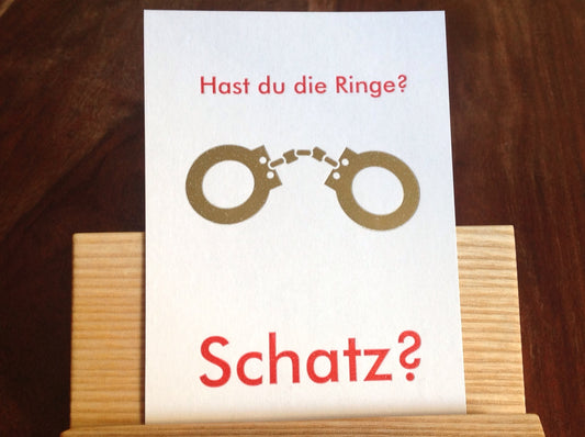 Postkarte Die Ringe Schatz? (Offizin Schwarze Kunst)