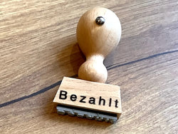 Textstempel "bezahlt" Holz