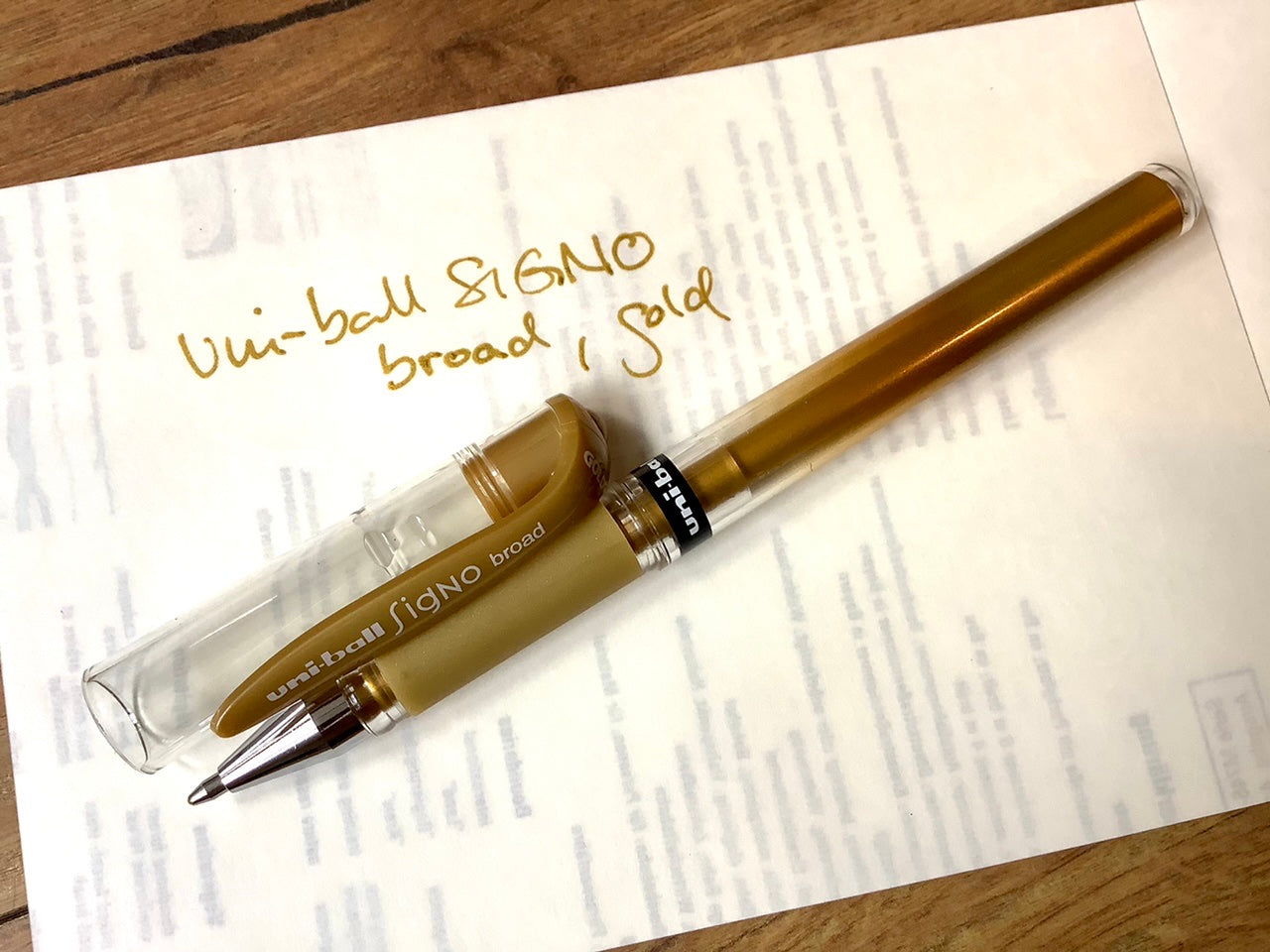 Gelschreiber Uniball Signo broad in gold