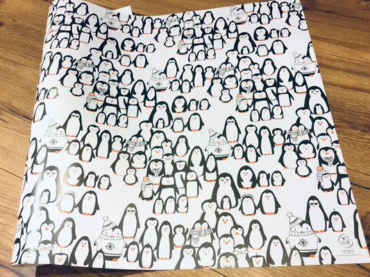 Geschenkpapier-Pinguinparade-winter-recycelt-bowhummingbird bei Polly Paper
