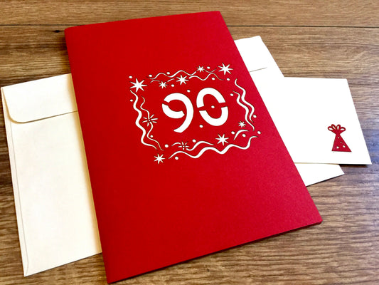  dreidimensionale Pop-up-Karte zum 90. Geburtstag - eine 90 klappt sich beim Öffnen auf. Erhältlich bei Polly Paper in Berlin-Mitte